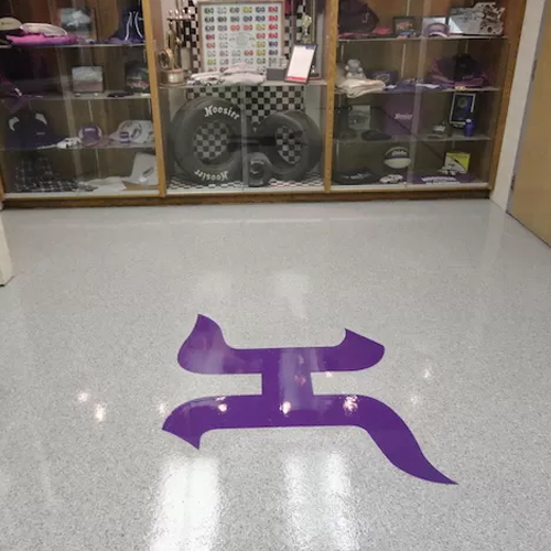 Commercial epoxy flooring with company logo